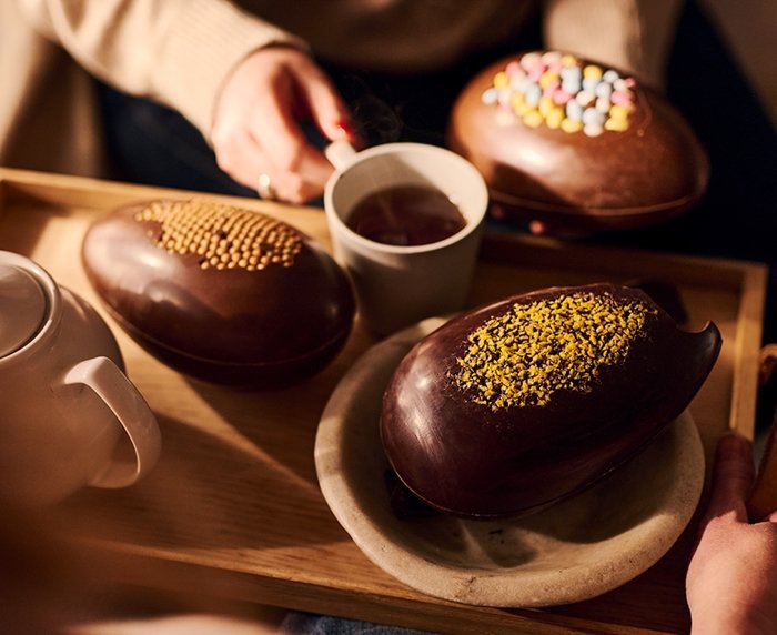 People eating lip shaped chocolate